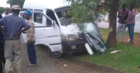 Man sitting under a tree injured in a taxi crash in Carletonville