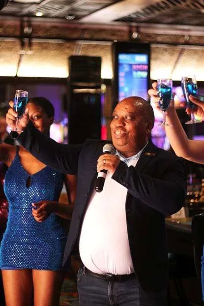 Wild Coast Sun General Manager, Henry Tshegetso Boekhouer (left) giving a cheers to the launch of Electric 8s, with employees, Cynthia Dumakude, the Resort’s marketing manager (far) right and other guests