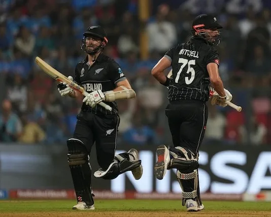 MUMBAI, INDIA - NOVEMBER 15: Kane Williamson (L) and Daryl Mitchell (R) of New Zealand during the ICC Men's Cricket World Cup 2023 semi final match between India and New Zealand at Wankhede Stadium on November 15, 2023 in Mumbai, India. (Photo by Isuru Sameera/Gallo Images)