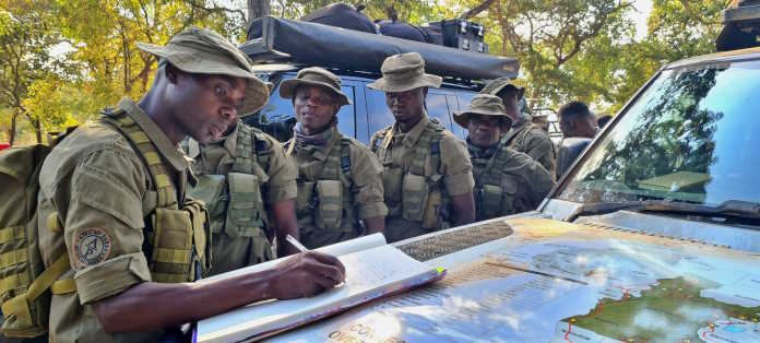 Malawi Nkhotakota ranger sign the Afrika Odyssey Scroll for Conservation