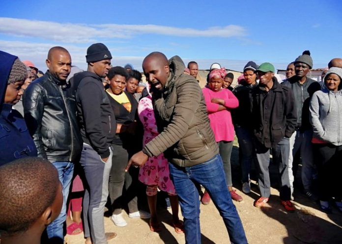 Land occupiers say they paid R150,000 for plots, but where is the money?