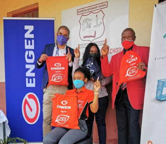 At the back from left to right Durrel Gibson Engen Operations Manager and Lesego Sikwane Engen area manager