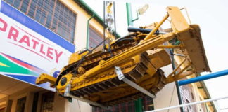 The iconic 13-tonne bulldozer at the entrance to the Pratley head office in Krugersdorp is suspended using a Pratley Wondafix