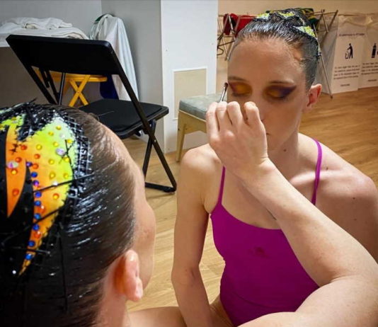 Laura Strugnell and Clarissa Johnston applying their Kryolan make-up for their swim