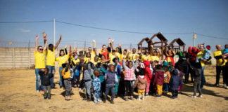 DHL Supply Chain South Africa volunteers with children from Olivers Village