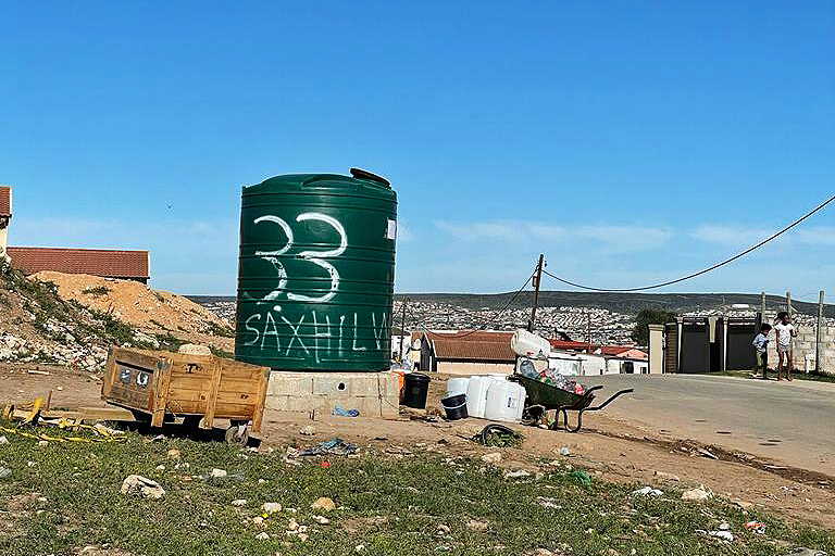 This 5,000-liter water tank, and another just like it, are the only two sources of water for the 5,000 residents of the impoverished Chris Hani township in Nelson Mandela Bay. 
