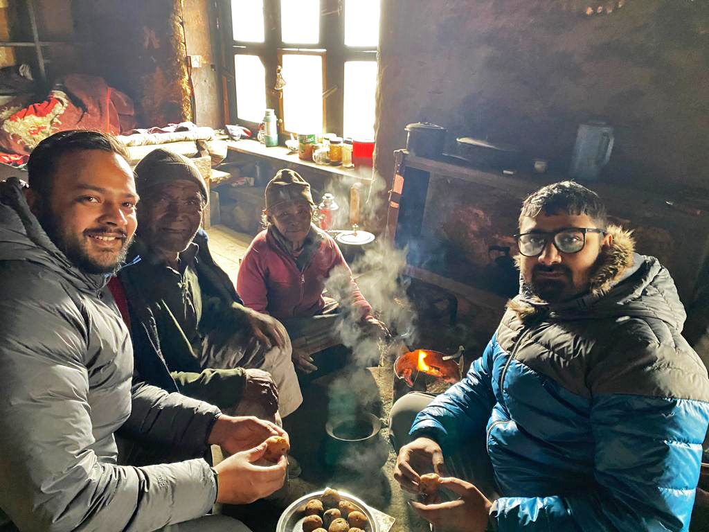 Adhikari and Bashyal meeting with a Sherpa family. 