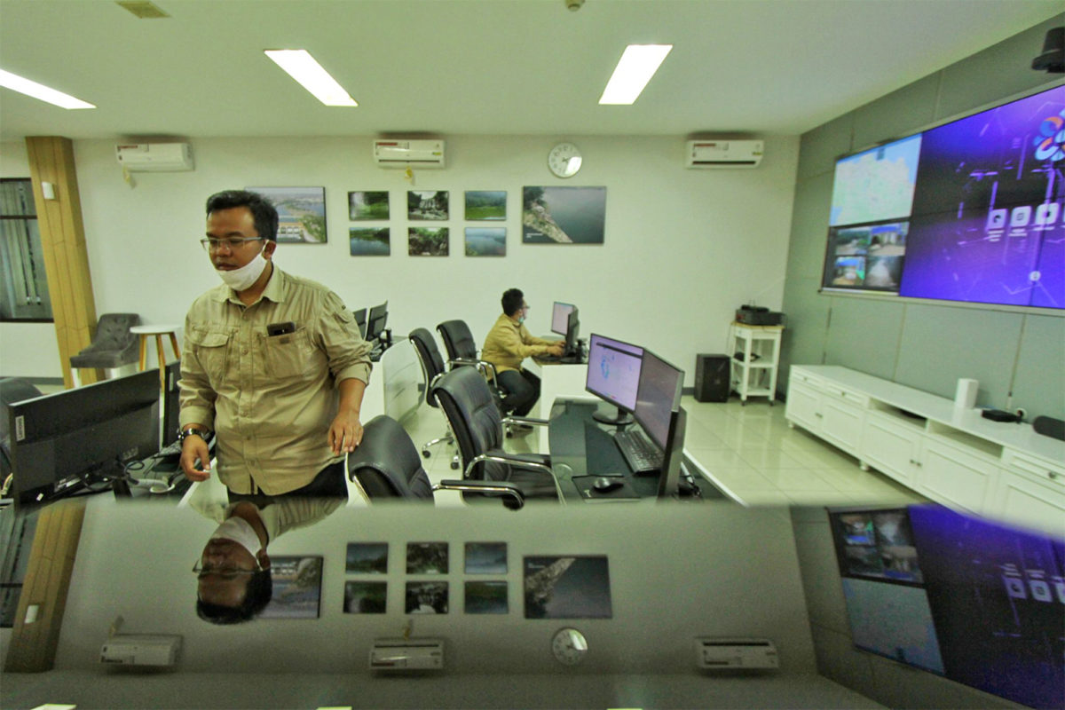 Shandy, left, at the command center in Bandung.