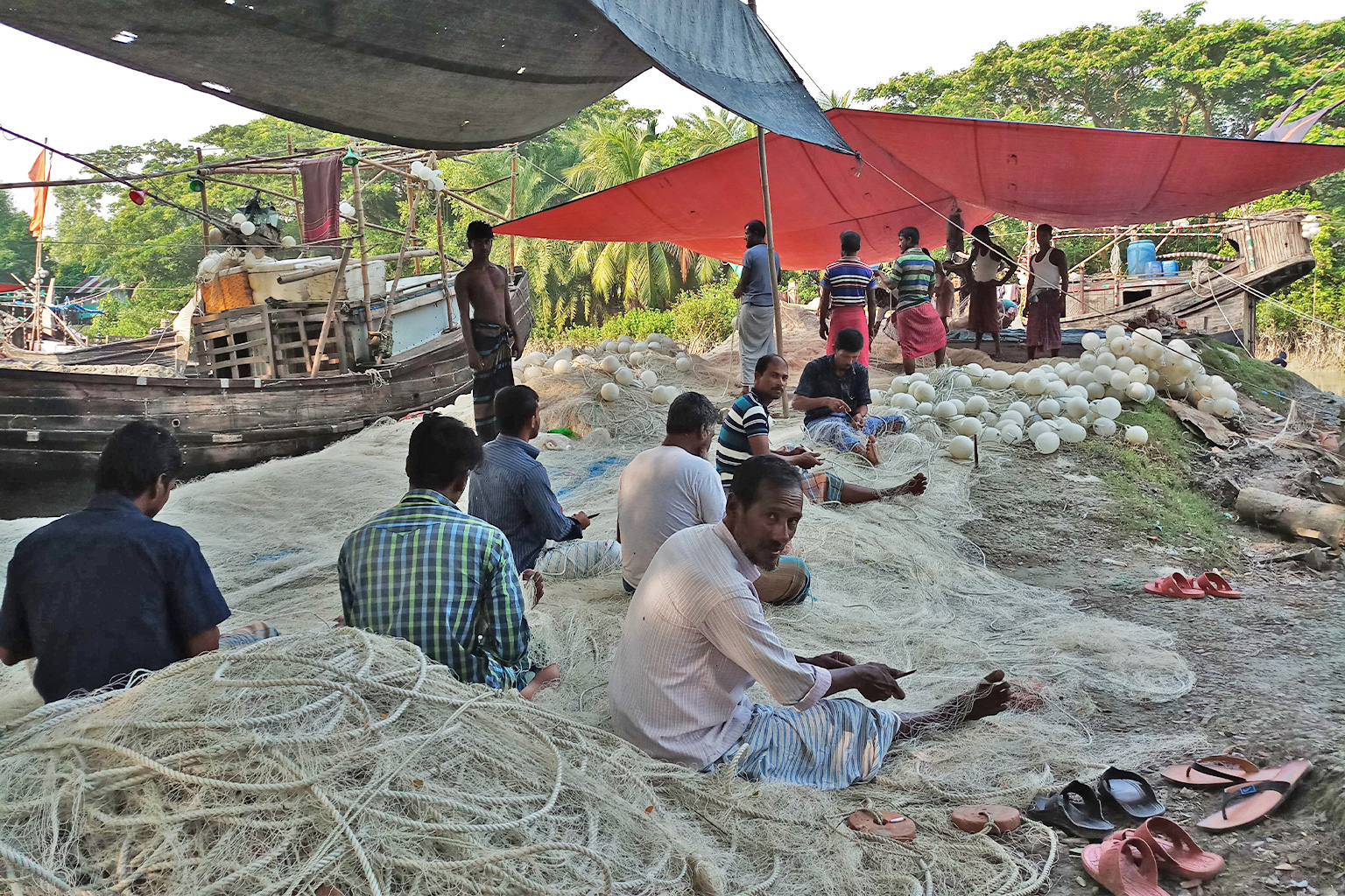Fishermen with nets.