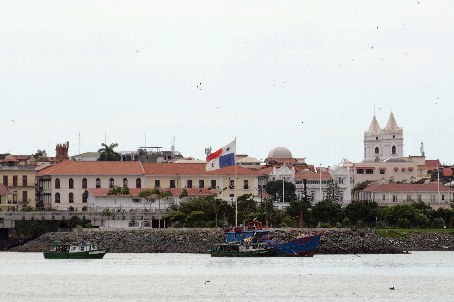 A fishing boat with a Panamanian flag. 