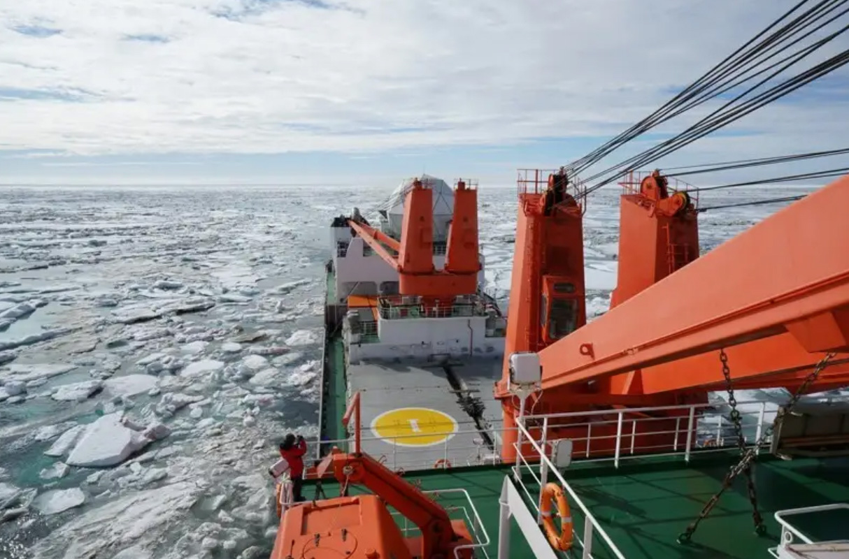 Researchers traveled aboard the icebreaker <em>R/V Xue Long</em> into an active melting zone in the Arctic Ocean to get samples for analysis. (Courtesy of Zhangxian Ouyang, Wei-Jun Cai and Liza Wright-Fairbanks/ University of Delaware)