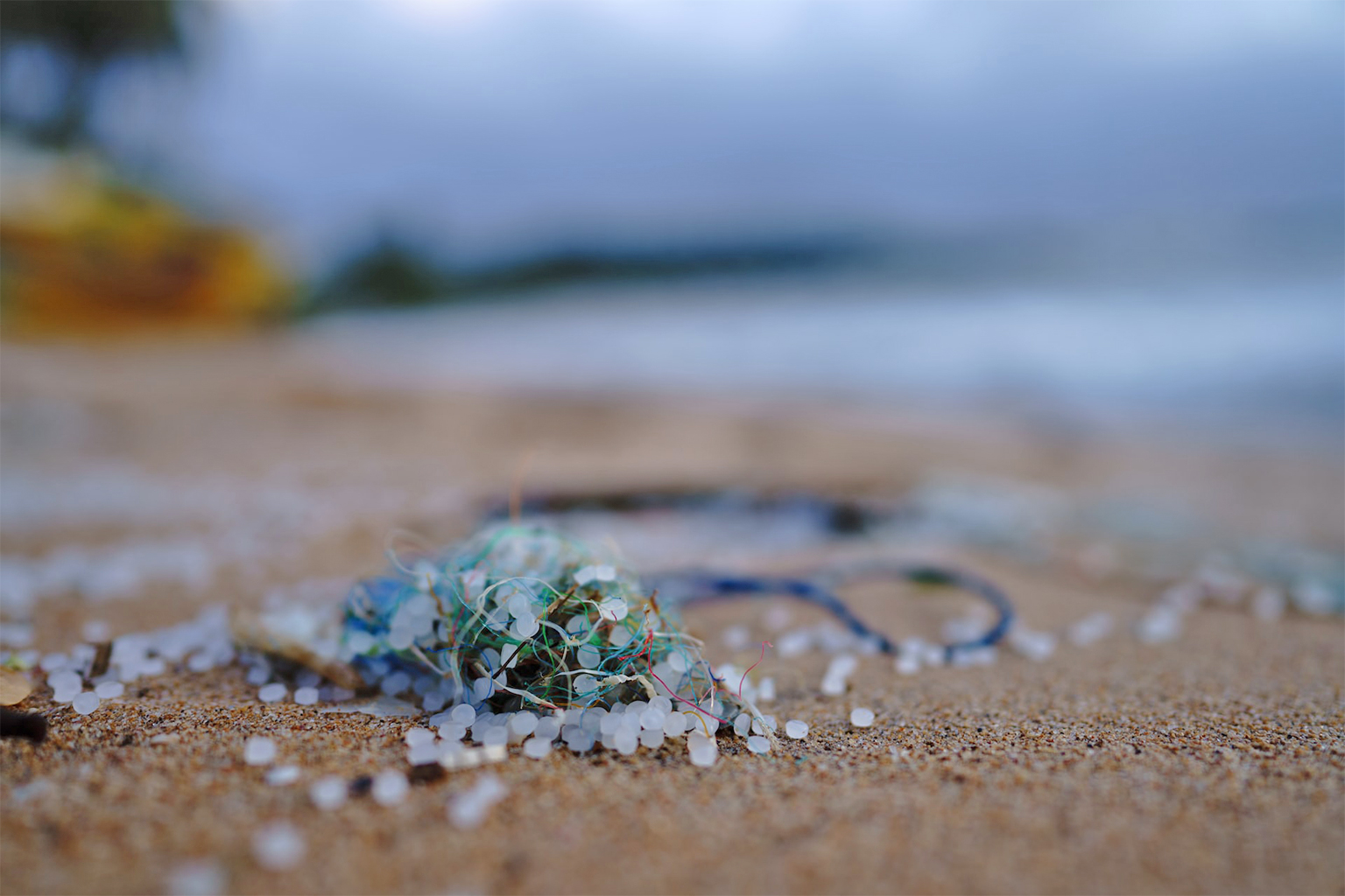 Plastic pellets on a beach.