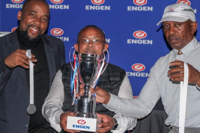 Sibonelo Mkhize GM of Tormin Mines with Jan Julies the chairman of the Matzikama Local Football Association and Itumeleng Motsopa Engen Strategic Services Manager