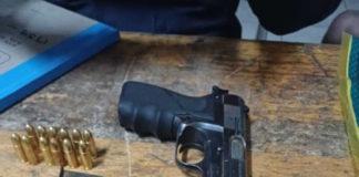 K9 police members detain suspects found n possession of an unlicensed firearm and ammunition