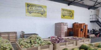 SA Harvest Cape Town warehouse filled with watermelons from OneFarm Share in bins donated by Agrimark