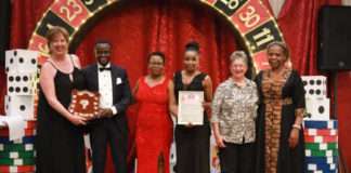 The Africa Albida Tourism team receiving one of their AZTA awards