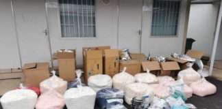 Two men arrested as police uncover clandestine drug laboratory and firearms