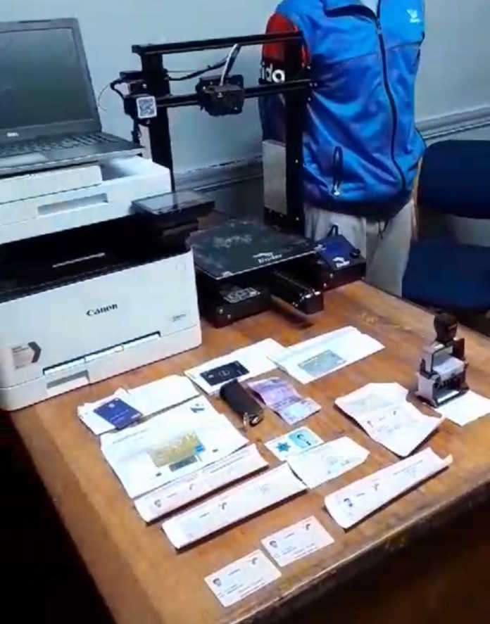 Foreign national arrested with fake police identification cards, police date stamp and drugs Foreign national arrested with fake police identification cards, police date stamp and drugs