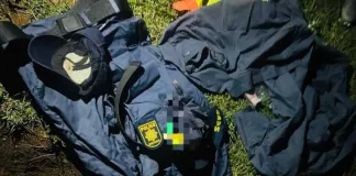 Murder suspect arrested with three unlicensed firearms