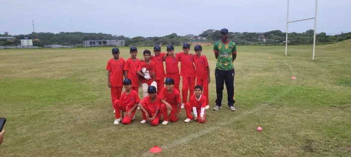 Coach-Alester-Maregwede-with-the-African-Warriors-Cricket-Team-1 Coach Alester Maregwede with the African Warriors Cricket Team