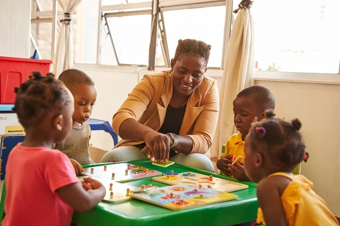 a_Lucia Shumbayaonda_owner and kids Lucia Shumbayaonda owner of Springs Tots, an ECD Centre in Gauteng.