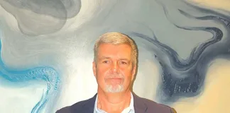 Henk Van Bemmelen CEO of Blue Security proudly displays the double Diamond Arrow Awards achieved at the 2025 PMR Africa Awards