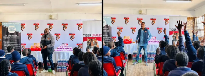 Addressing learners from Nyiko Primary, Maanda Milubi, Director Enterprise and Supplier Development, Tiger Brands (left) and Freddie Masike from Tiger Brands’ premium bread brand, Albany (right)