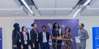 From left to right USIU’s Azza Mohamed, Jane Gititu, Shanice Muthoni, Samuel Mbugua, Antoinette Bonita, Mary Njoki (Glass House PR), and Tenda Mtana (Chief of Party, Kaya Advisory), during the award ceremony of the University PR Challenge held at the Aga Khan University, Nairobi. USIU emerged the winner, with Strathmore University finishing second, Mount Kenya University (MKU) securing third, and Riara University placing fourth.