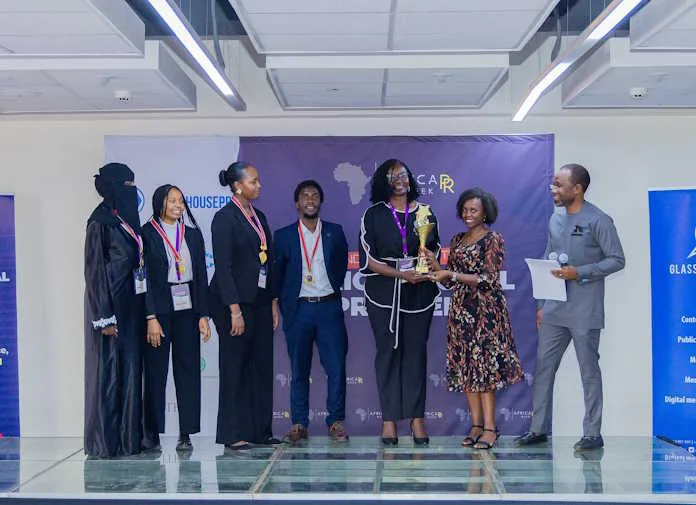 PR-Challenge-1-2048x1485 From left to right USIU’s Azza Mohamed, Jane Gititu, Shanice Muthoni, Samuel Mbugua, Antoinette Bonita, Mary Njoki (Glass House PR), and Tenda Mtana (Chief of Party, Kaya Advisory), during the award ceremony of the University PR Challenge held at the Aga Khan University, Nairobi. USIU emerged the winner, with Strathmore University finishing second, Mount Kenya University (MKU) securing third, and Riara University placing fourth.