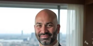 Travis Jank, President and Founder of KRAMBU