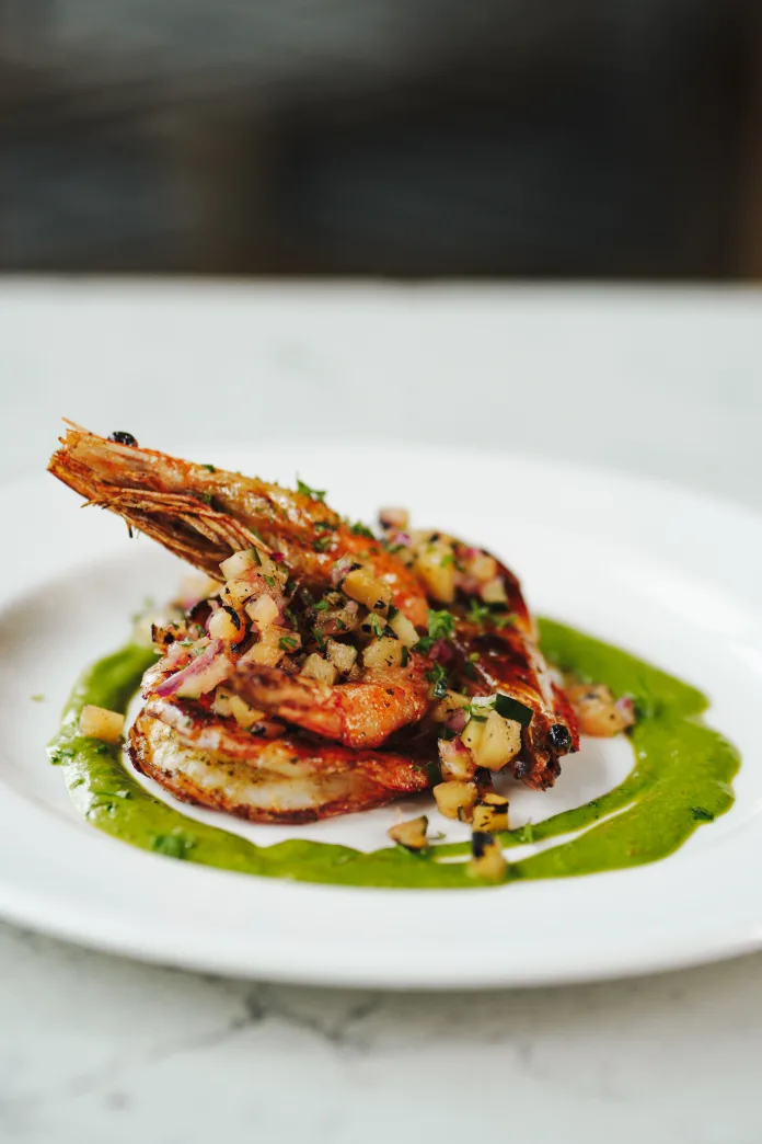 “Prawn to be Wild”, comprising grilled prawns with a spicy coconut and coriander sauce and burnt pineapple salsa, is summer adventure on a plate. It’s tipped to be a favourite at the Radisson RED Johannesburg-Rosebank. Photo: Setlife Studios SA