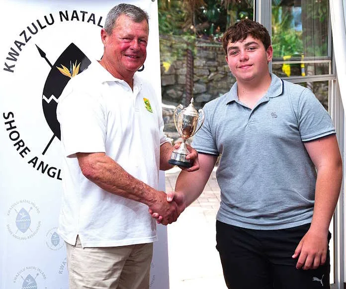 Barry Wareham congratulates Jeanu Fivaz, winner of the Castaways Angling Club Trophy for the top U16 Individual Angler of the Year across both formats.