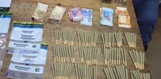 Police Seize Drugs, SANDF Uniform, and Cash Police Seize Drugs, SANDF Uniform, and Cash