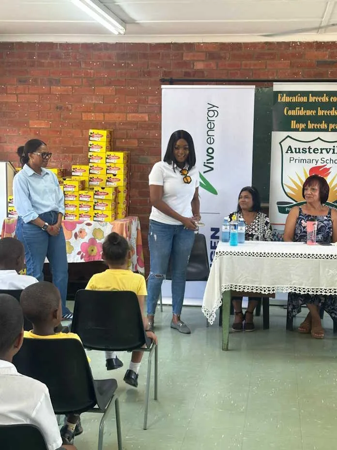Engen CSI Manager Olwethu Mdabula at the Austerville Primary Back to School school shoe hand over
