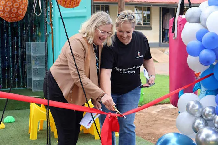 Lana Roy and Dr Dee Blackie cutting the ribbon