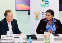 Advtech Group CEO Geoff Whyte with Deputy Minister for Higher Education Training Dr Mimmy Gondwe