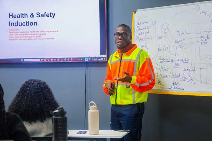 Makgetse Thulare, Occupational Health and Safety (OHS) Officer at Afrirent Holdings, engages with young participants on the importance of workplace safety